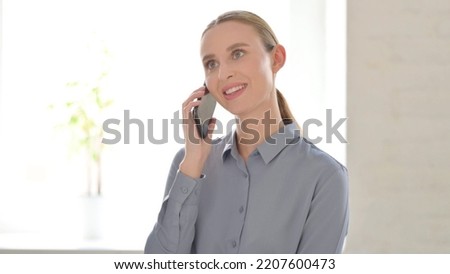 Portrait of Woman Talking on Phone