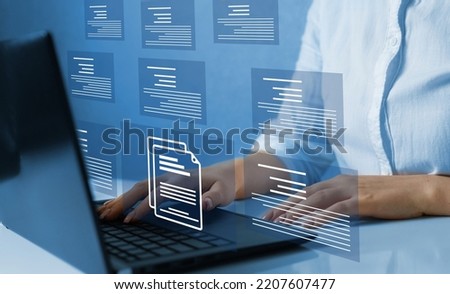 Online documentation database and document management system concept.	
Businesswoman working on laptop with virtual screen. Process automation to efficiently manage files. 