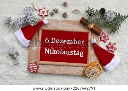 Chalkboard with the text  6. Dezember Nikolaustag.
6. Dezember Nikolaustag means translated December 6th is St. Nicholas Day.