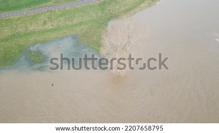 Aerial view of high water in the river! Dikes and breakwaters above the waterline!  