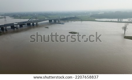 Aerial view of high water in the river! Dikes and breakwaters above the waterline!  
