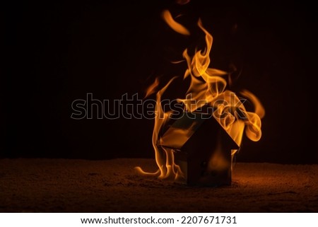 Photo of a terrible house fire. The concept of fire safety. Background picture.