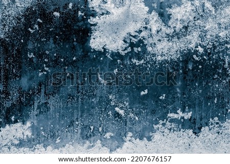 Ice texture background. The textured cold frosty surface of ice blocks on dark background. Royalty-Free Stock Photo #2207676157