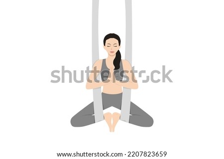 Bound Angle Pose Aerial. Beautiful girl practice Baddha Konasana Aerial. Young attractive woman practicing yoga exercise. working out, black wearing sportswear, grey pants and top, indoor full length Royalty-Free Stock Photo #2207823659