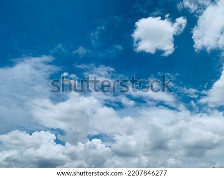 Beautiful cumulus clouds fuzzy clouds background the sun is shining what a beautiful day at Bangkok,Thailand.no focus