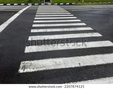 zebra cross is a crossing place for pedestrians who want to pass