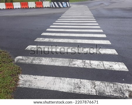 zebra cross is a crossing place for pedestrians who want to pass