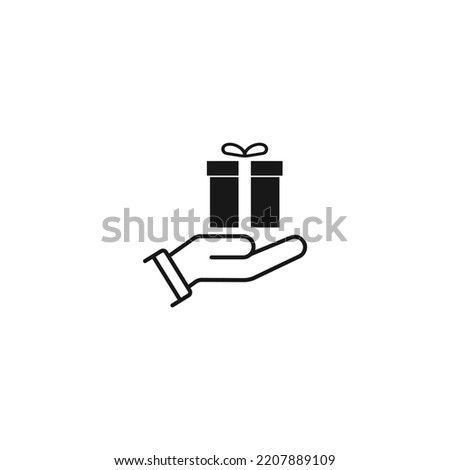 Gift in hand icon vector graphics