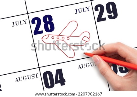 28th day ofJuly. A hand drawing outline of airplane on calendar date 28 July. The date of flight on plane. Travel, business trips. Summer month. Day of the year