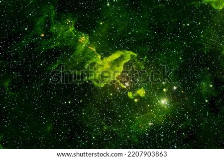 Beautiful green space nebula. Elements of this image furnished by NASA. High quality photo