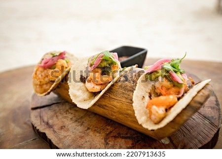 Traditional Mexican Prawn tacos close up, tacos on the beach in Mexico