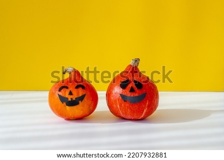Funny Halloween pumpkin ghosts heads. Halloween holiday background