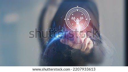 AI recruiting technology concept. Using artificial intelligence in the talent acquisition process. A robot choosing business people to hire. HR technology ecosystem strategies for HR professionals. Royalty-Free Stock Photo #2207933613