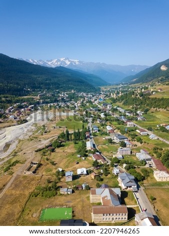 Drone view of the mountainous town of Mestia on a sunny day, Svaneti region, Georgia.This is a high-altitude town in the north-west of Georgia, at an altitude of 1500 meters in the Caucasus mountains.