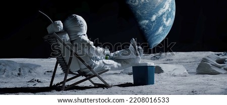 Back view of lunar astronaut having a beer while resting in a beach chair on Moon surface, saluting to Earth
