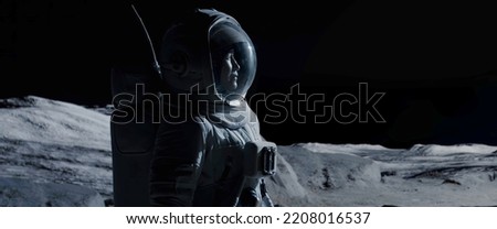 Portrait of Asian lunar astronaut opens his visor while exploring Moon surface Royalty-Free Stock Photo #2208016537