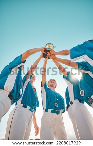 Women baseball, team trophy and winning celebration for success in sports, championship or competition achievement. Happy girl softball players, winner group and excited athletes holding award prize Royalty-Free Stock Photo #2208017929