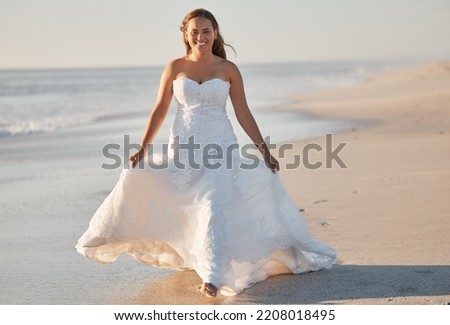 Beach, wedding and portrait of a bride walking along the sea, happy and relax in classic wedding dress. Freedom, celebration and just married girl enjoying nature and ocean while looking cheerful
