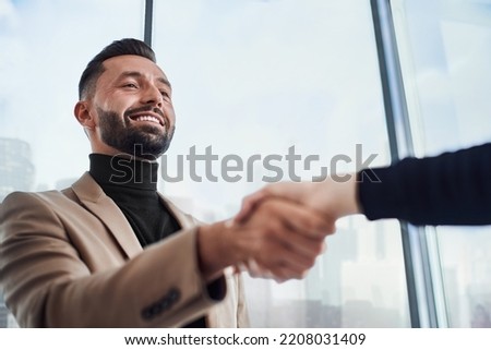 businessman shaking hands with a business partner.