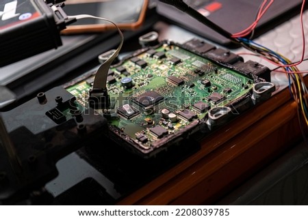 Detail of Car ecu bench reading method for remapping and power Increase. Tuning Car Ecu electronic. Royalty-Free Stock Photo #2208039785
