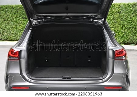 rear view of the car open trunk The exterior of a modern, modern car empty trunk Royalty-Free Stock Photo #2208051963