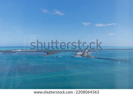 aerial view of Miami bay, with port, sailboats and yachts, bridges and roads