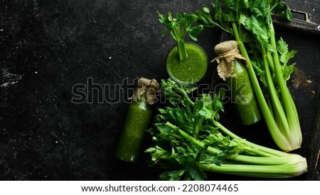 Celery. Celery smoothies in glass bottles. Detox menu. Free space for text. Royalty-Free Stock Photo #2208074465