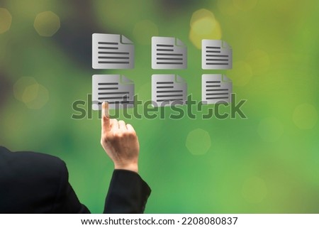 Businessman pointing file icon. Metadata Catalog Document Management System concept
