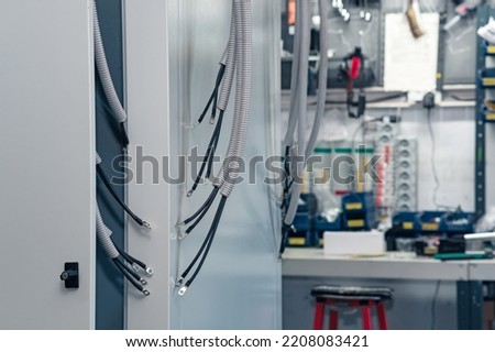 electrical equipment in the process of assembly in the workshop Royalty-Free Stock Photo #2208083421