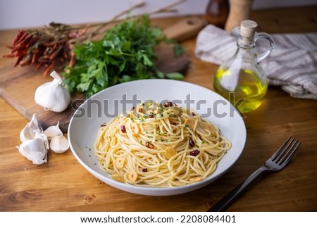 Aglio, olio e peperoncino, italian traditional pasta Royalty-Free Stock Photo #2208084401