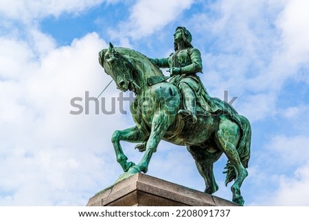Equestrian statue of Joan of Arc (Jeanne d'Arc) in Orleans, France; bronze outdoor monument Royalty-Free Stock Photo #2208091737