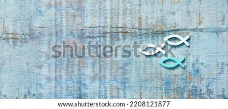 fish on rustic wooden board - confirmation, communion, baptism  greeting card rustic or invitation 	
maritim background banner Royalty-Free Stock Photo #2208121877