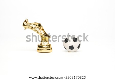 A picture of golden boot with football ball. Top scorer in football.