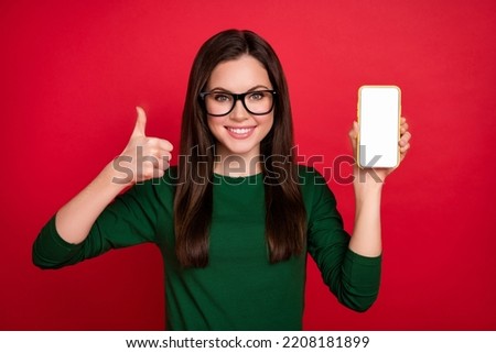 Photo of cool brunette boss lady show telephone thumb up wear eyewear green shirt isolated on red color background