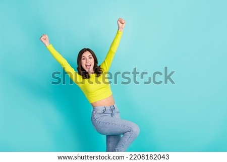 Photo of young attractive pretty nice girl fists up celebrating pms menstruation healthy nice isolated on aquamarine color background Royalty-Free Stock Photo #2208182043