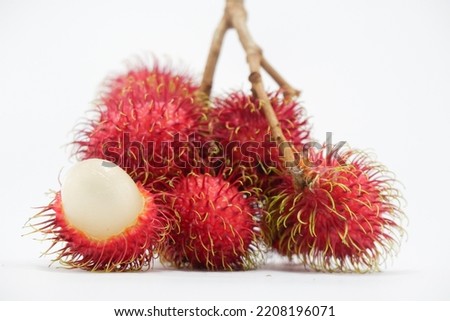 Rambutan (Nephelium lappaceum) on isolated white background. Fruit with sweet and sour taste after ripe.
