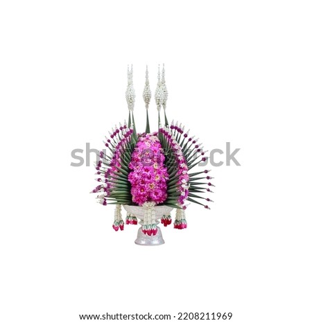 Thailand style of rice offering (pan bai sri )decorative with pink flower and green banana leaf folded isolated on white background , clipping path