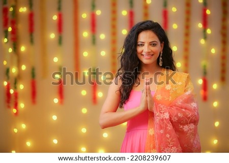 Female celebrating diwali with full of happiness Royalty-Free Stock Photo #2208239607