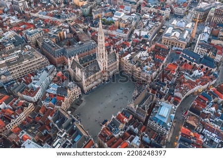 Aerial view of Grand Place square and Town Hall (Hôtel de Ville de Bruxelles). Sunset cityscape of the City of Brussels, Belgium Royalty-Free Stock Photo #2208248397