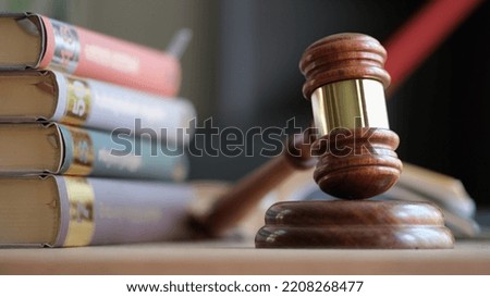 Justice and jurisprudence and judge gavel concept. Law books on desk of lawyer in law firm