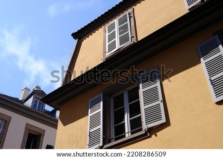 Vintage House in Strasbourg, France with Blue Sky.
