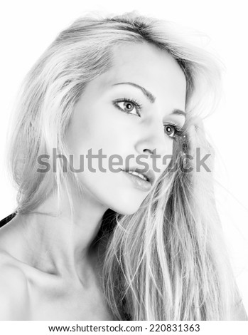 Fashion model with blonde hair on white background. Black and white version.