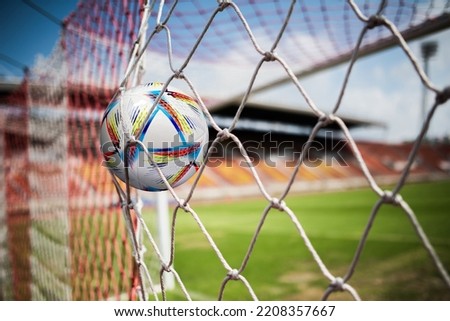 Soccer into goal success concept Royalty-Free Stock Photo #2208357667