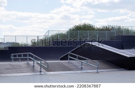 Skate park during the day. Empty, no people skating park. Skatepark ramps Royalty-Free Stock Photo #2208367887