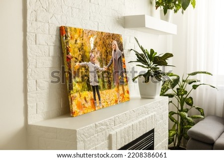 photo canvas with a family in autumn