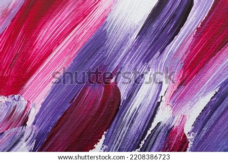 Strokes of colorful oil paints on white canvas, closeup