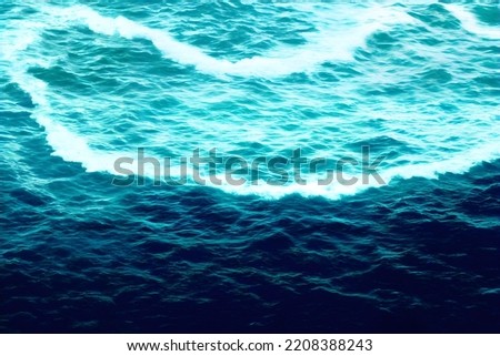 an abstract background of blue ocean waves, wallpaper photo