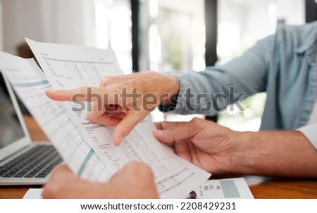 Finance, budget and retirement people planning paperwork, savings or bills for wealth, investment and pension income. Senior couple hands reading financial document, tax management or life insurance Royalty-Free Stock Photo #2208429231