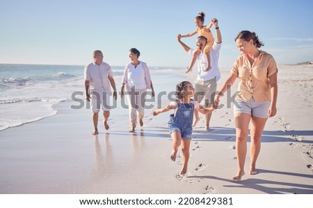 Family, beach and happy in cancun vacation in summer with smile, laugh and love together walking on the sand. Laugh, bonding and chasing joy while men, women and kids playing on holiday travel
