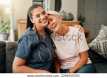 Senior woman, hug or medical caregiver in house living room in comfort trust, support or security bond. Smile, happy or laughing nursing home retirement elderly and healthcare Brazilian nurse or help Royalty-Free Stock Photo #2208430341